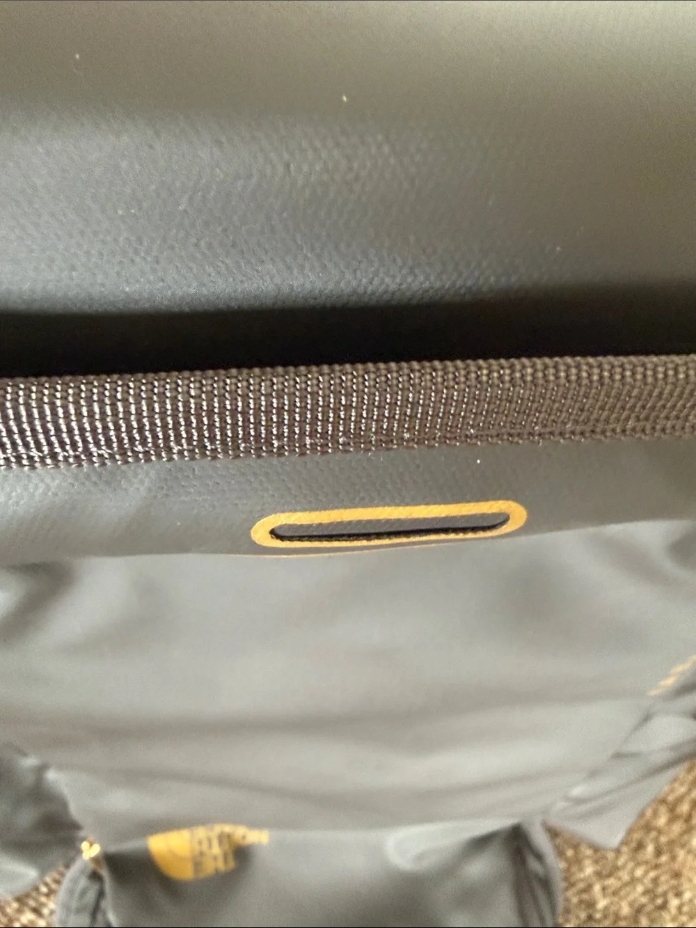 The North Face Black Backpack with Gold Logo Accent Kaban